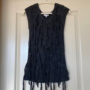 Excellent condition!!  Short sleeve fringed sweater.